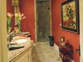 Luxury bathroom featuring vanity, granite countertops and ample space