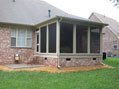 Comfortable screened porch design on a Nashville custom home